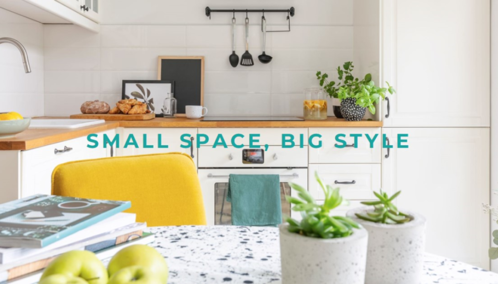 A bright and stylish small kitchen space featuring white cabinetry, wooden countertops, and a yellow chair, with the text ‘SMALL SPACE_BIG STYLE’ overlaid.