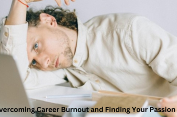 An individual leaning on a desk with their head resting on their arm, appearing exhausted, with a blurred laptop and papers in the foreground. A title overlay reads “Overcoming Career Burnout and Finding Your Passion.