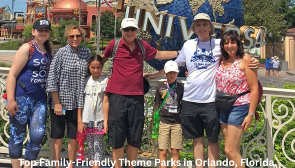 A group of visitors posing for a photo at the entrance of Universal Studios in Orlando, Florida, with the iconic rotating globe and park name in the background.